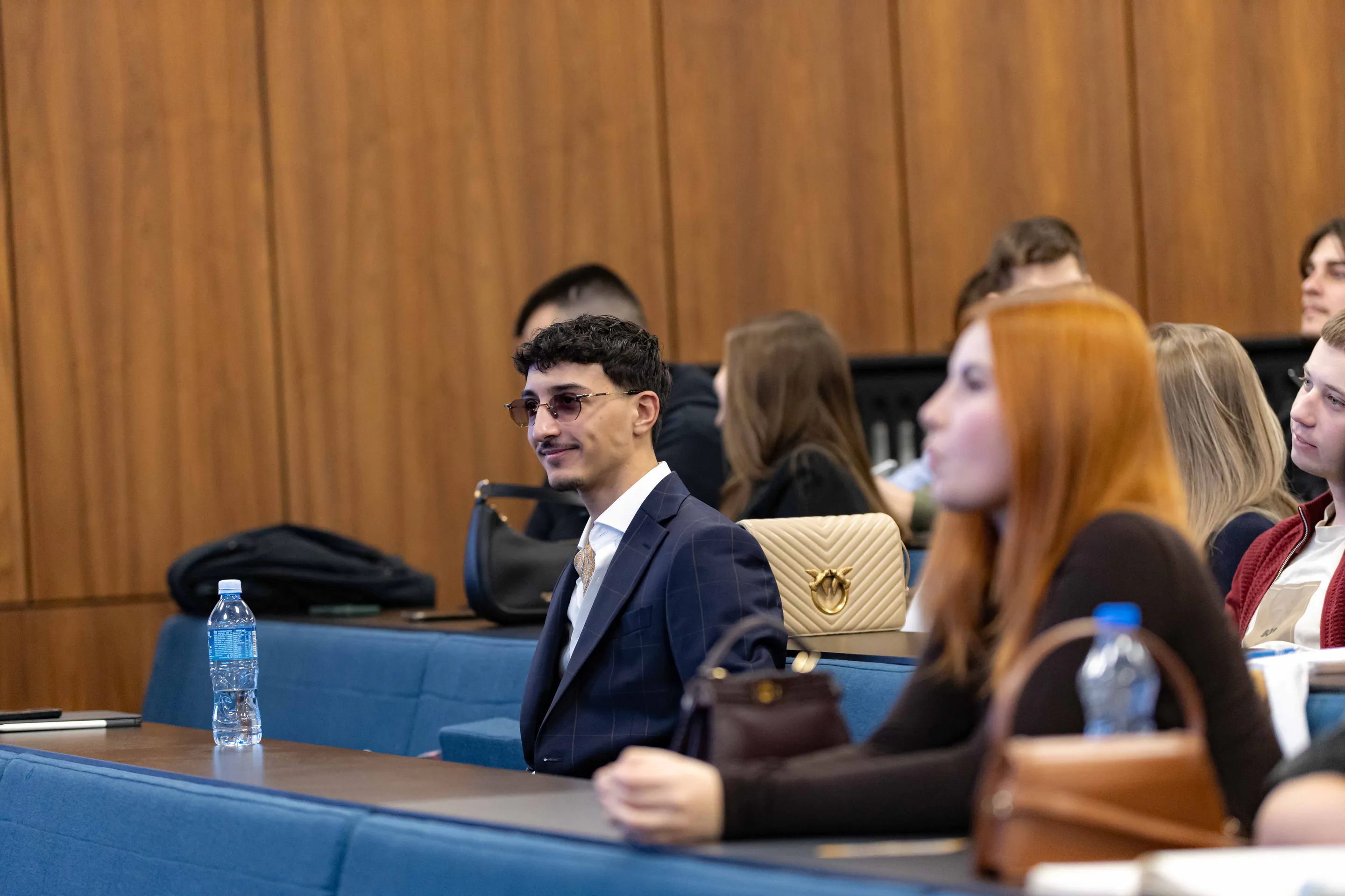 Guests seated along the panel table